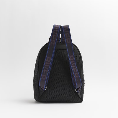 Boys black nylon quilted backpack River Island