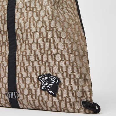 Boys brown RI jacquard nylon bag