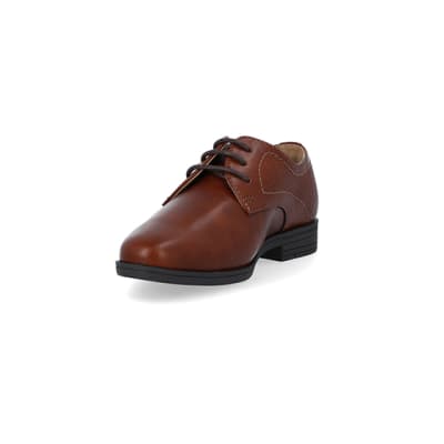 360 degree animation of product Boys Brown wide fit embossed shoes frame-23