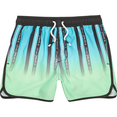 boys green swim trunks