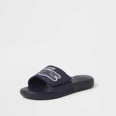 lacoste junior sliders