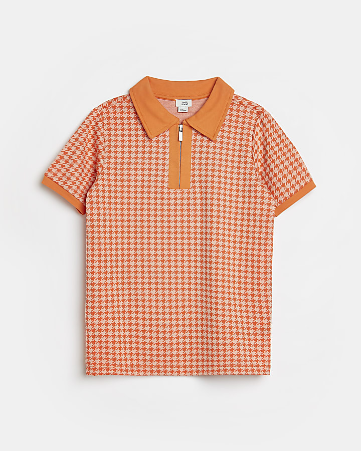 Boys orange dogtooth zip neck polo shirt