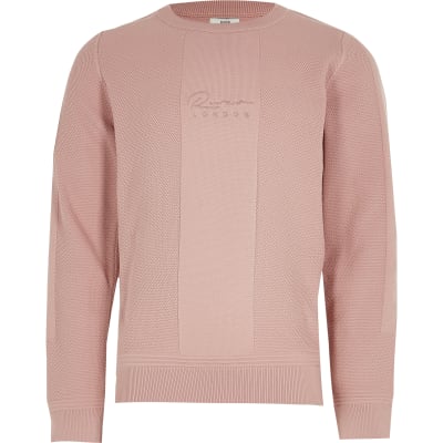 pink knitted jumper
