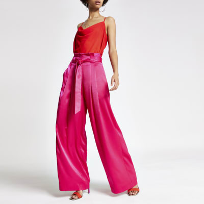 Bright pink wide leg trousers | River Island