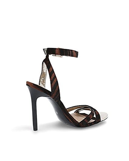 360 degree animation of product Brown animal print cross strap heeled sandals frame-13