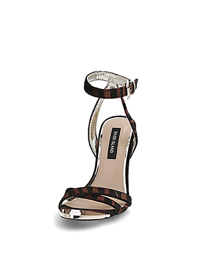 360 degree animation of product Brown animal print cross strap heeled sandals frame-22