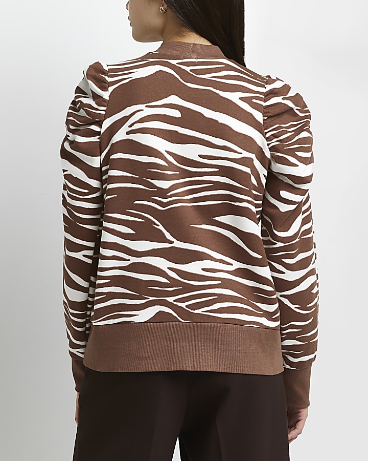 Brown animal print ruffled sweatshirt