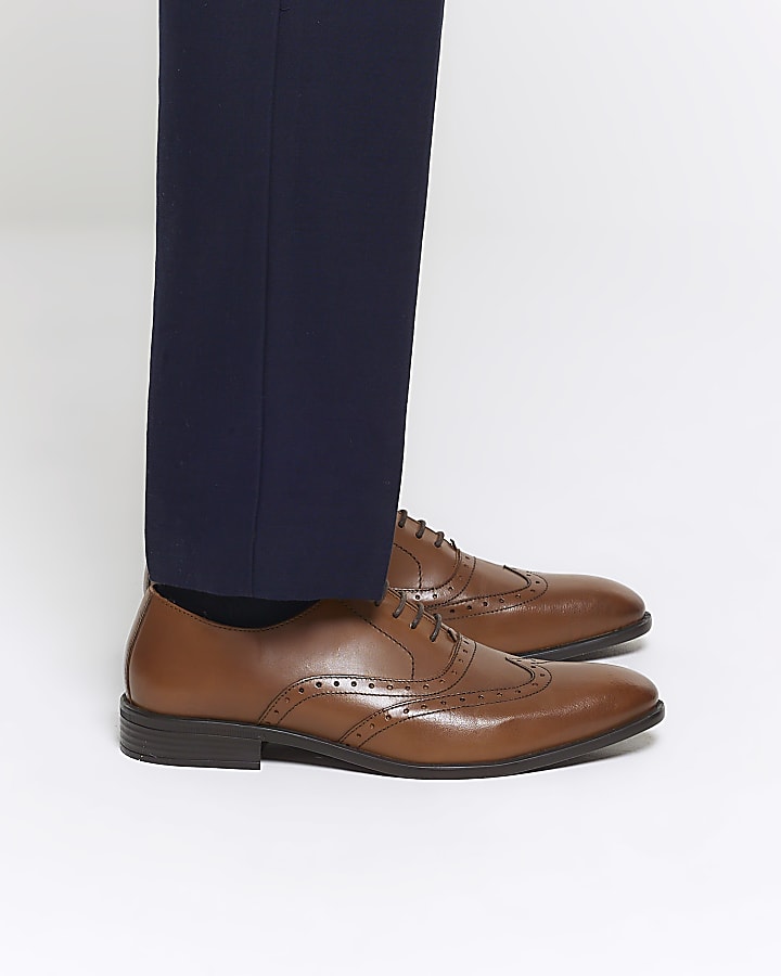 Brown brogue derby shoes