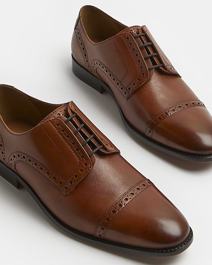 Brown brogue lace up shoes