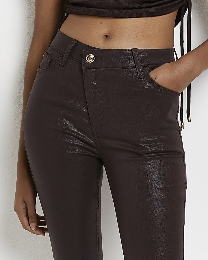 Brown coated high waisted skinny jeans
