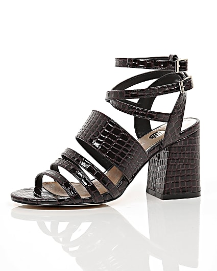 360 degree animation of product Brown croc strappy block heel sandals frame-23