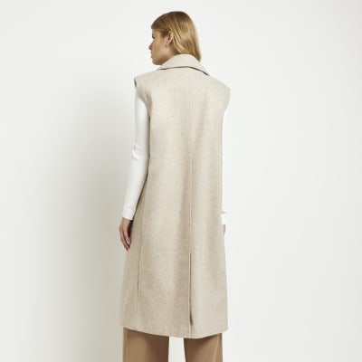Brown double breasted sleeveless coat