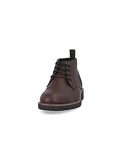 360 degree animation of product Brown lace up chukka boots frame-22