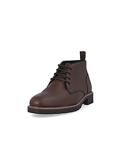 360 degree animation of product Brown lace up chukka boots frame-23