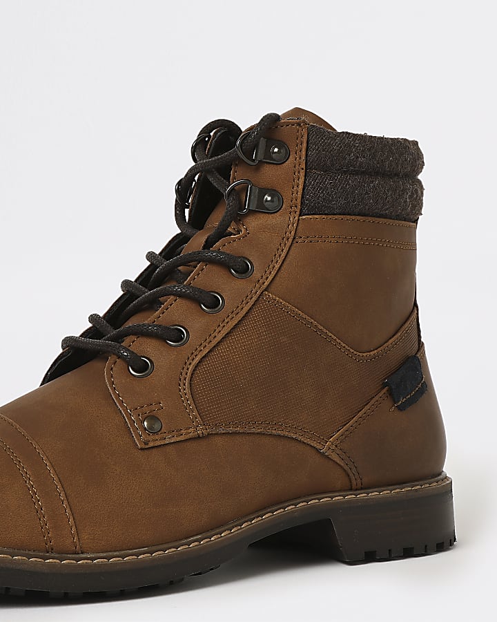 Brown lace up military boots