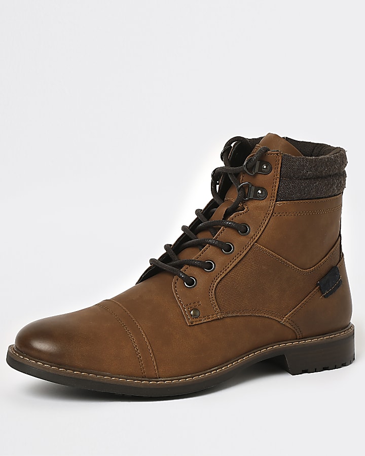 Brown lace up military boots