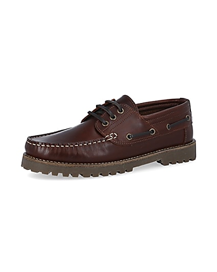 360 degree animation of product Brown leather cleated sole boat shoes frame-1