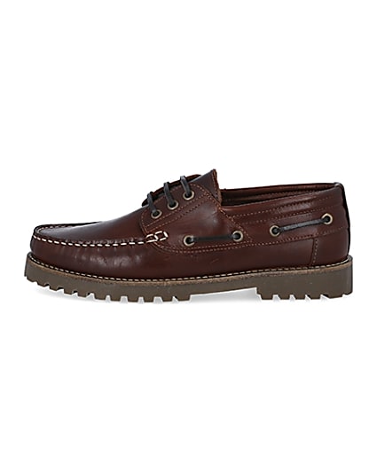 360 degree animation of product Brown leather cleated sole boat shoes frame-3