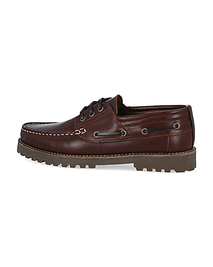 360 degree animation of product Brown leather cleated sole boat shoes frame-4