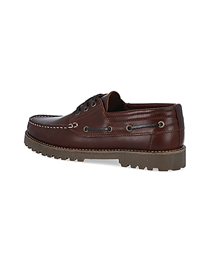 360 degree animation of product Brown leather cleated sole boat shoes frame-5