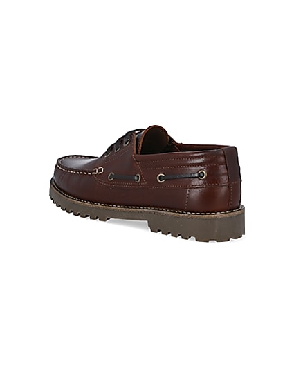 360 degree animation of product Brown leather cleated sole boat shoes frame-6