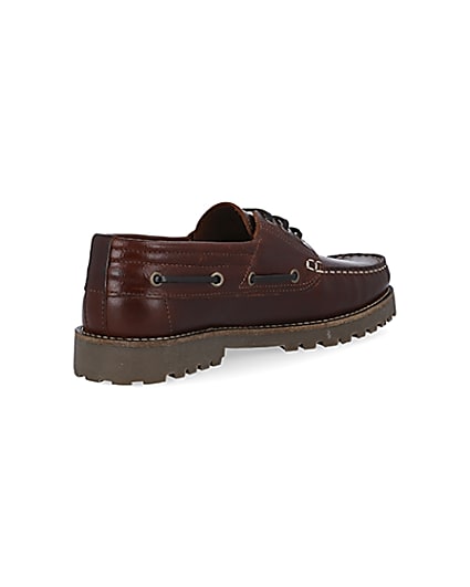 360 degree animation of product Brown leather cleated sole boat shoes frame-12