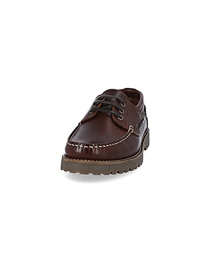 360 degree animation of product Brown leather cleated sole boat shoes frame-22