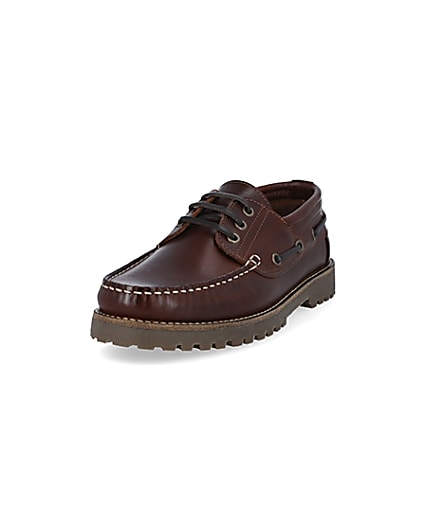 360 degree animation of product Brown leather cleated sole boat shoes frame-23