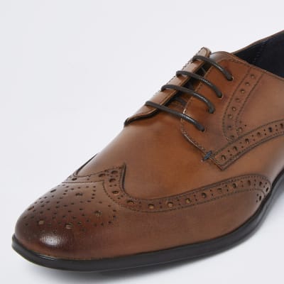 Brown leather lace up brogue derby shoes