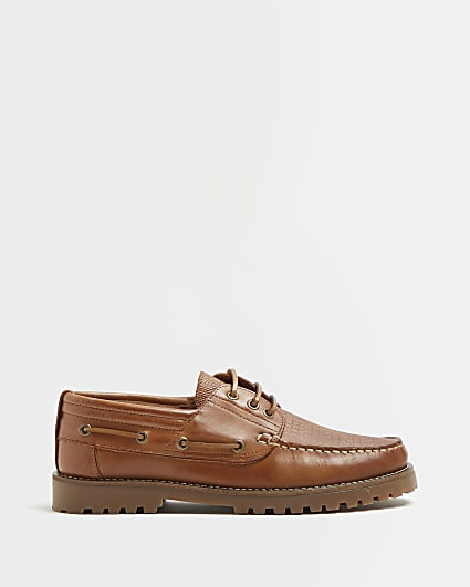 Brown leather RI monogram cleated boat shoes