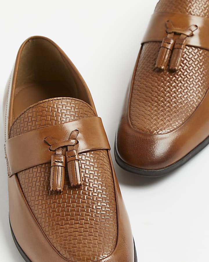 Brown leather tassel detail embossed loafers