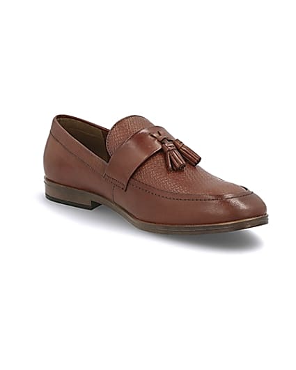 360 degree animation of product Brown leather tassel front textured loafers frame-18