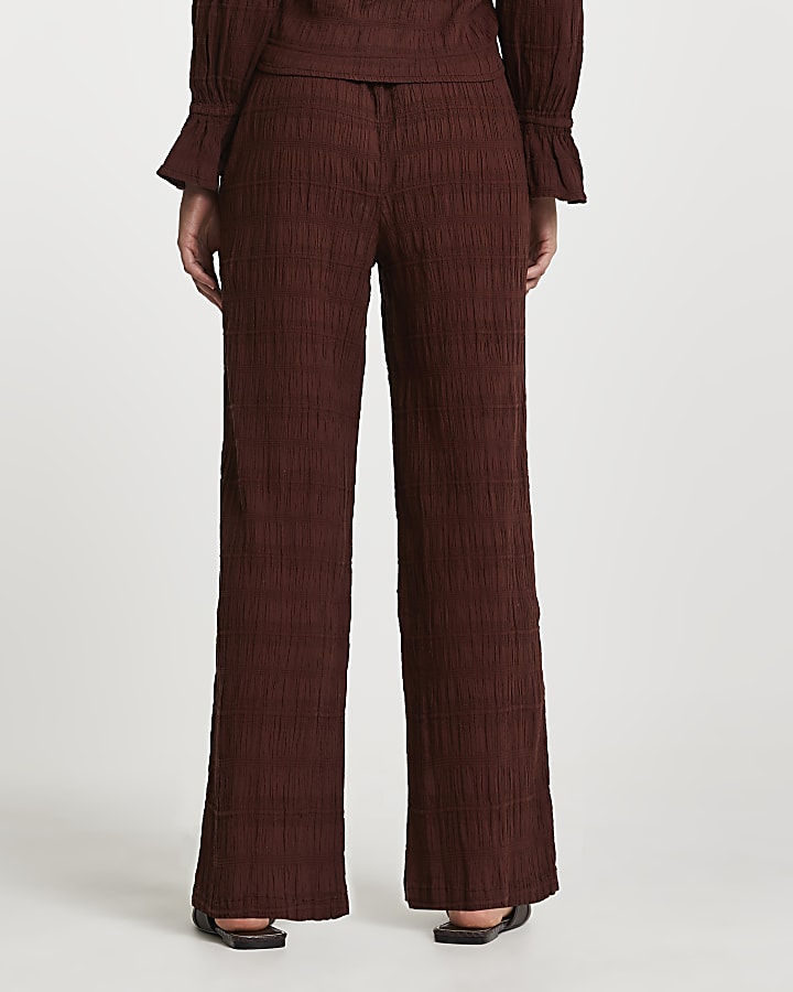 Brown long crinkled trousers