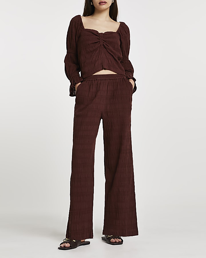 Brown long crinkled trousers