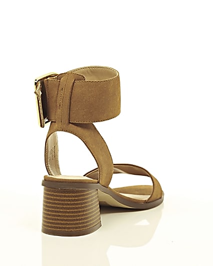 360 degree animation of product Brown oversized buckle sandals frame-14