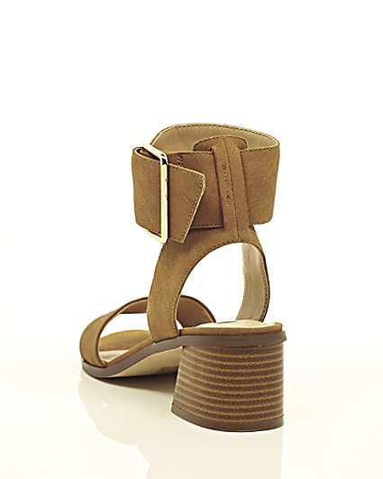 360 degree animation of product Brown oversized buckle sandals frame-17