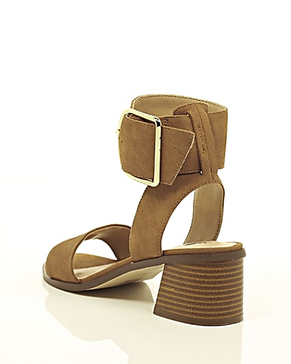 360 degree animation of product Brown oversized buckle sandals frame-18