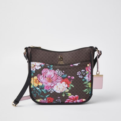 Brown RI monogram floral messenger bag | River Island