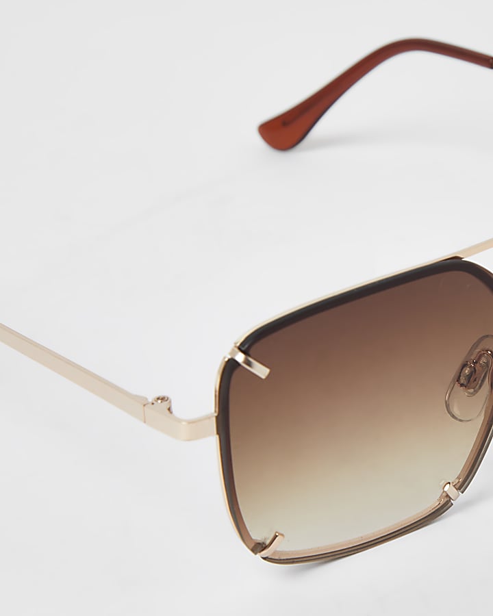 Brown rimless aviator sunglasses