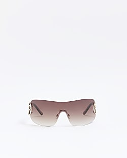 Brown rimless wrap sunglasses