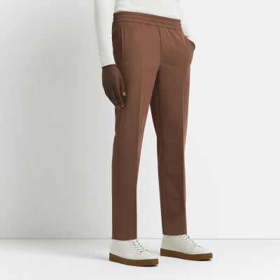 Brown slim fit elasticated waist trousers | River Island