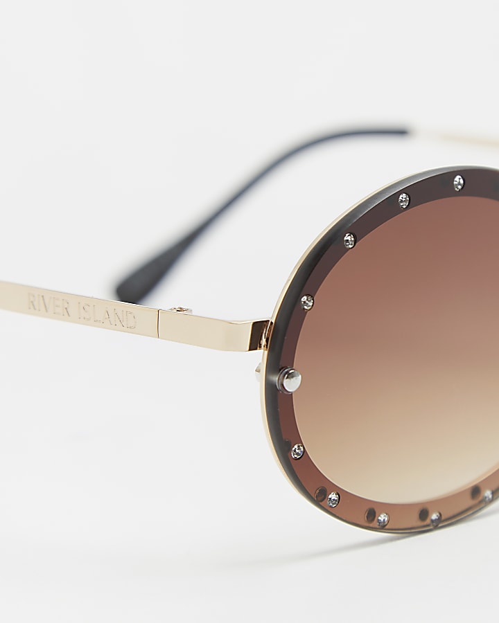 Brown studded oval sunglasses
