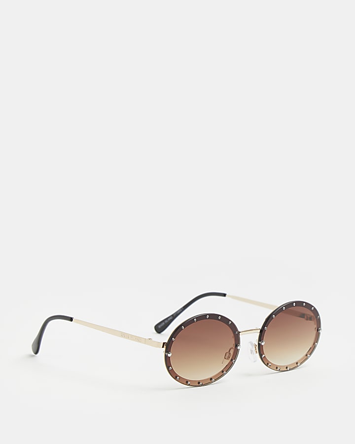 Brown studded oval sunglasses