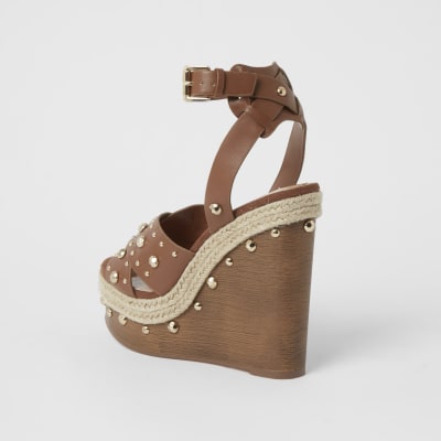 Brown studded wooden wedge sandals