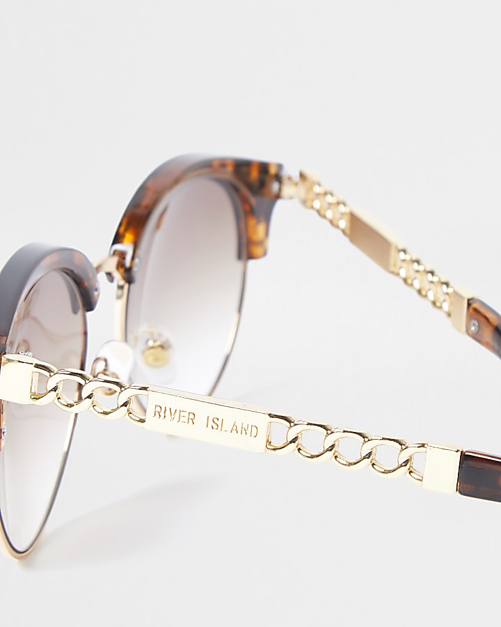 Brown tortoiseshell chain trim sunglasses