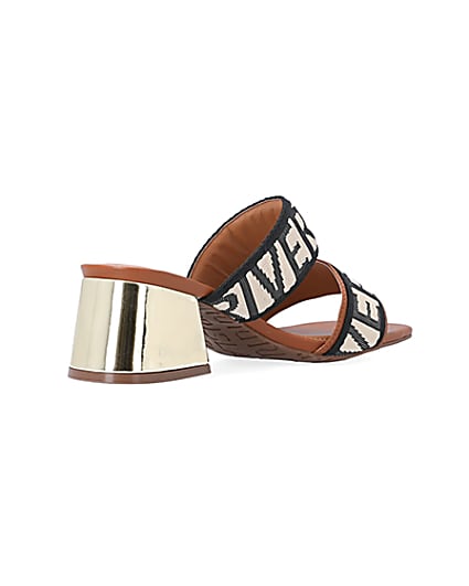 360 degree animation of product Brown wide fit RI monogram heeled sandals frame-12