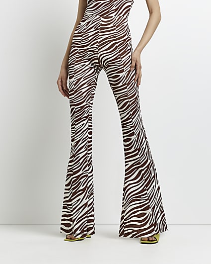 Brown zebra printed flared trousers