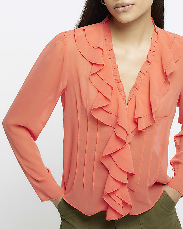 Coral long sleeve ruffle blouse