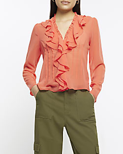 Coral long sleeve ruffle blouse