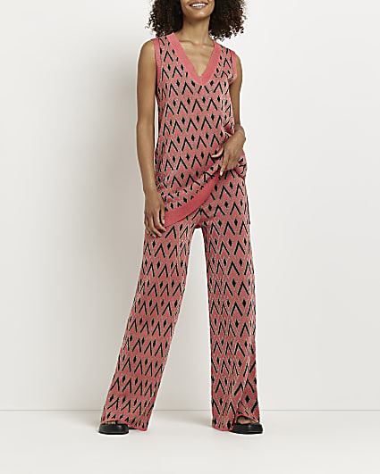 Coral print knit flared trousers